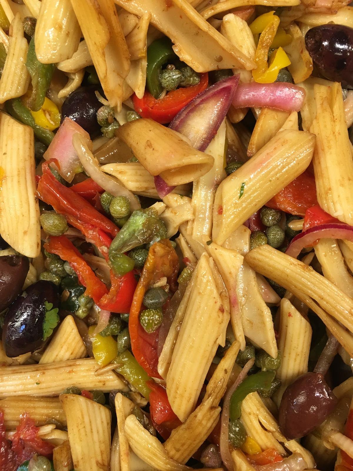 Penne with peppers, olives and capers.
